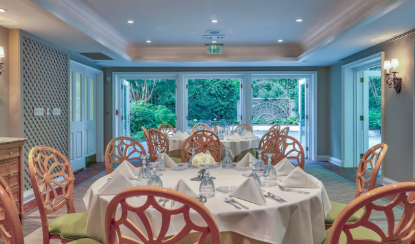 French doors of the BelleNita Room open onto the patio and garden
